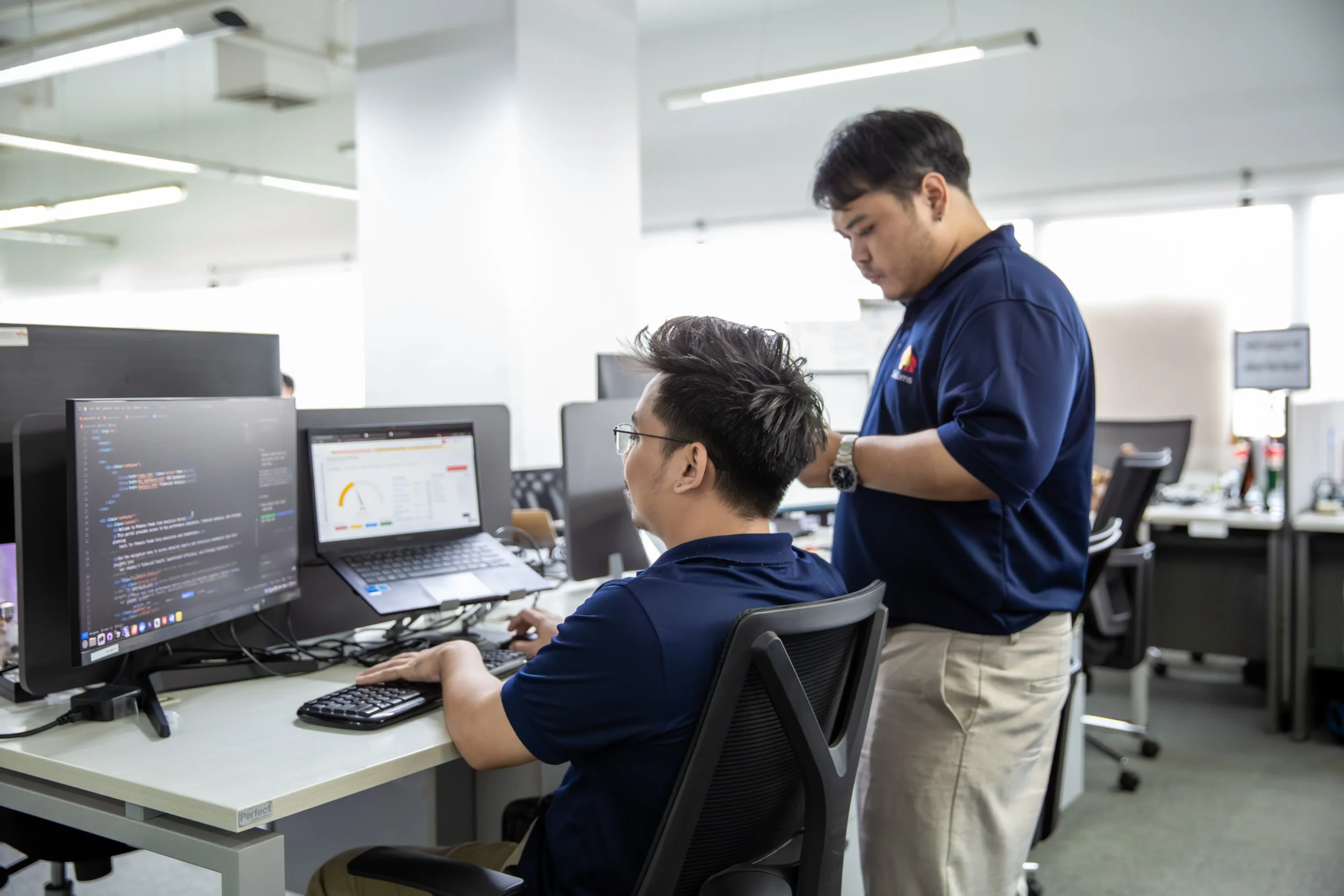 IT professionals working in a modern business office.