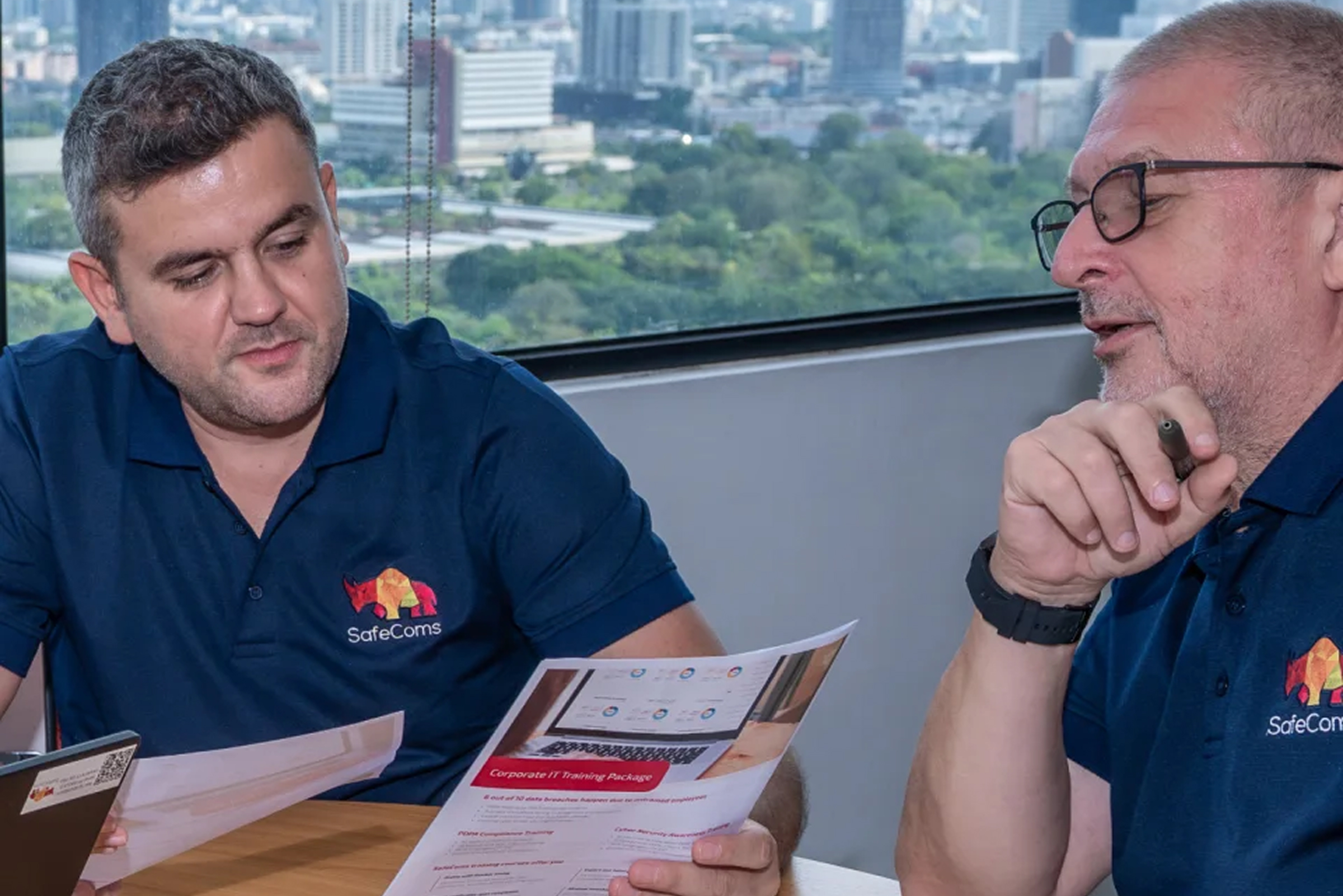 Professionals collaborating on network security projects.